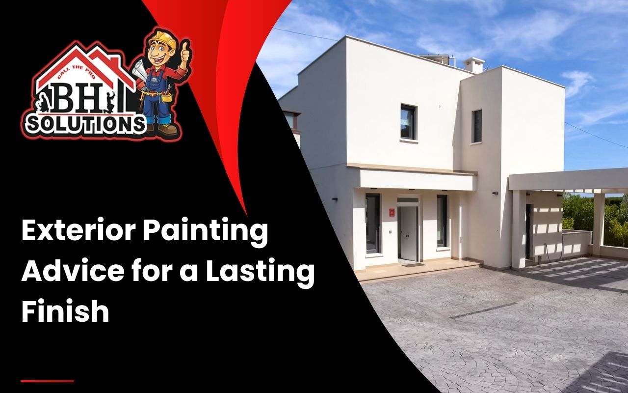 Professional cleaning and priming an exterior wall before painting.