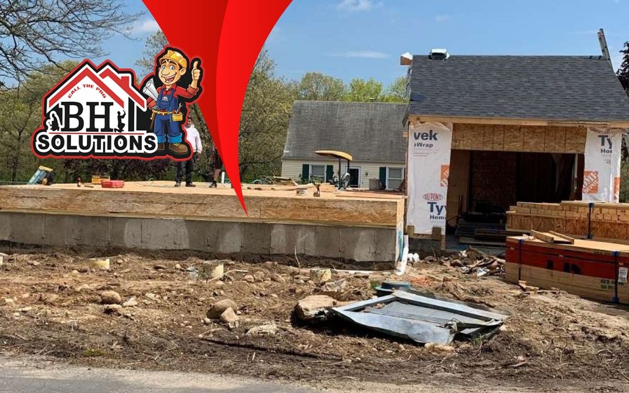 A renovated living room with recycled wood flooring.