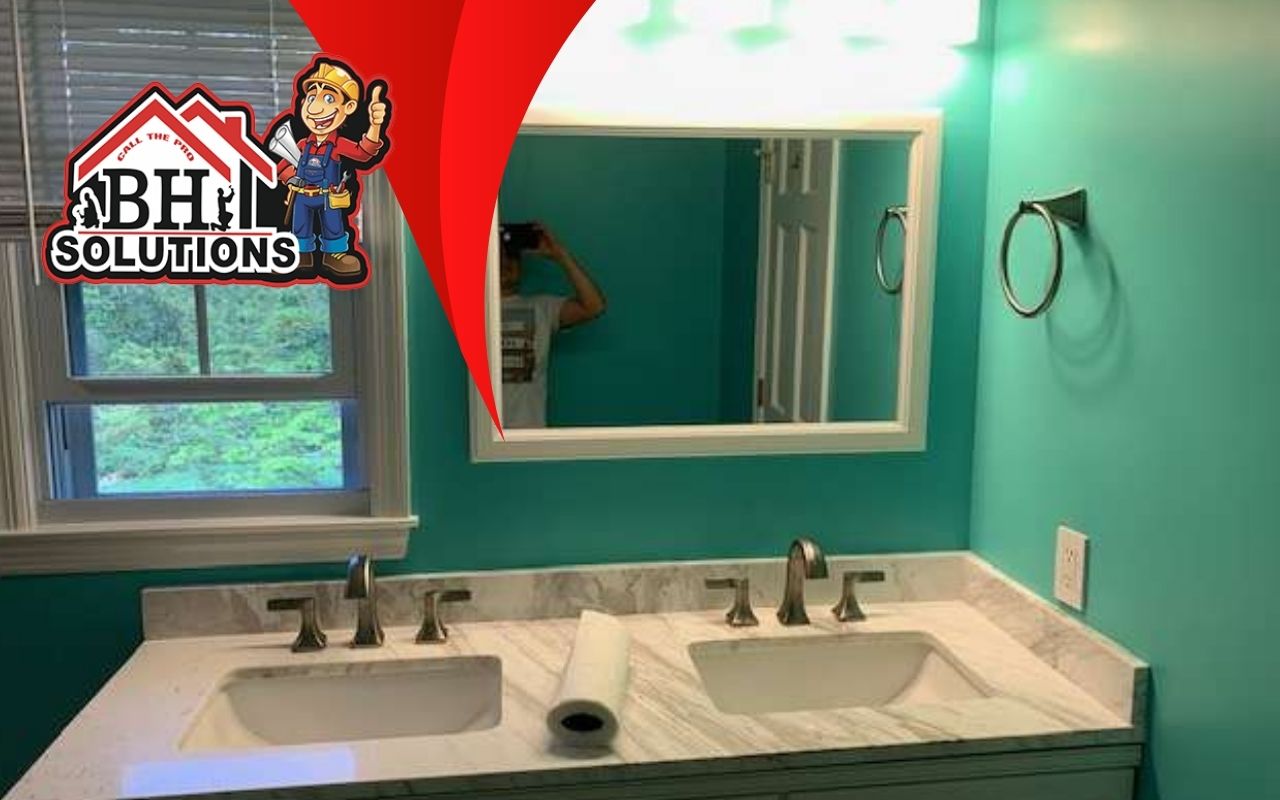 LED strip and pendant lights in a sleek modern bathroom