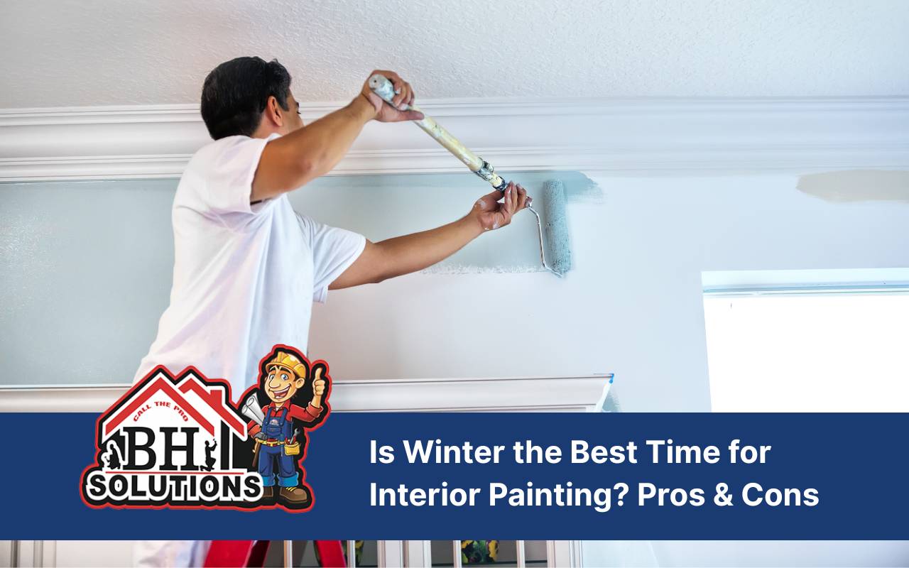 A homeowner completes interior painting in winter in a cozy living room.