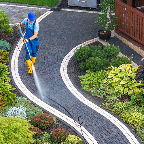 Pressure washing in Stamford, CT preparing surfaces for painting.
