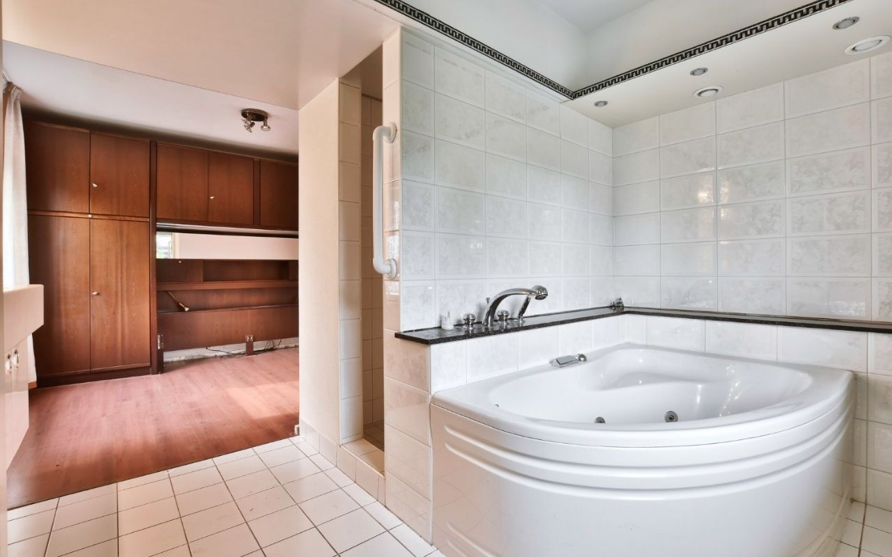 Modern bathroom remodel in Fairfield County with new tile and vanity