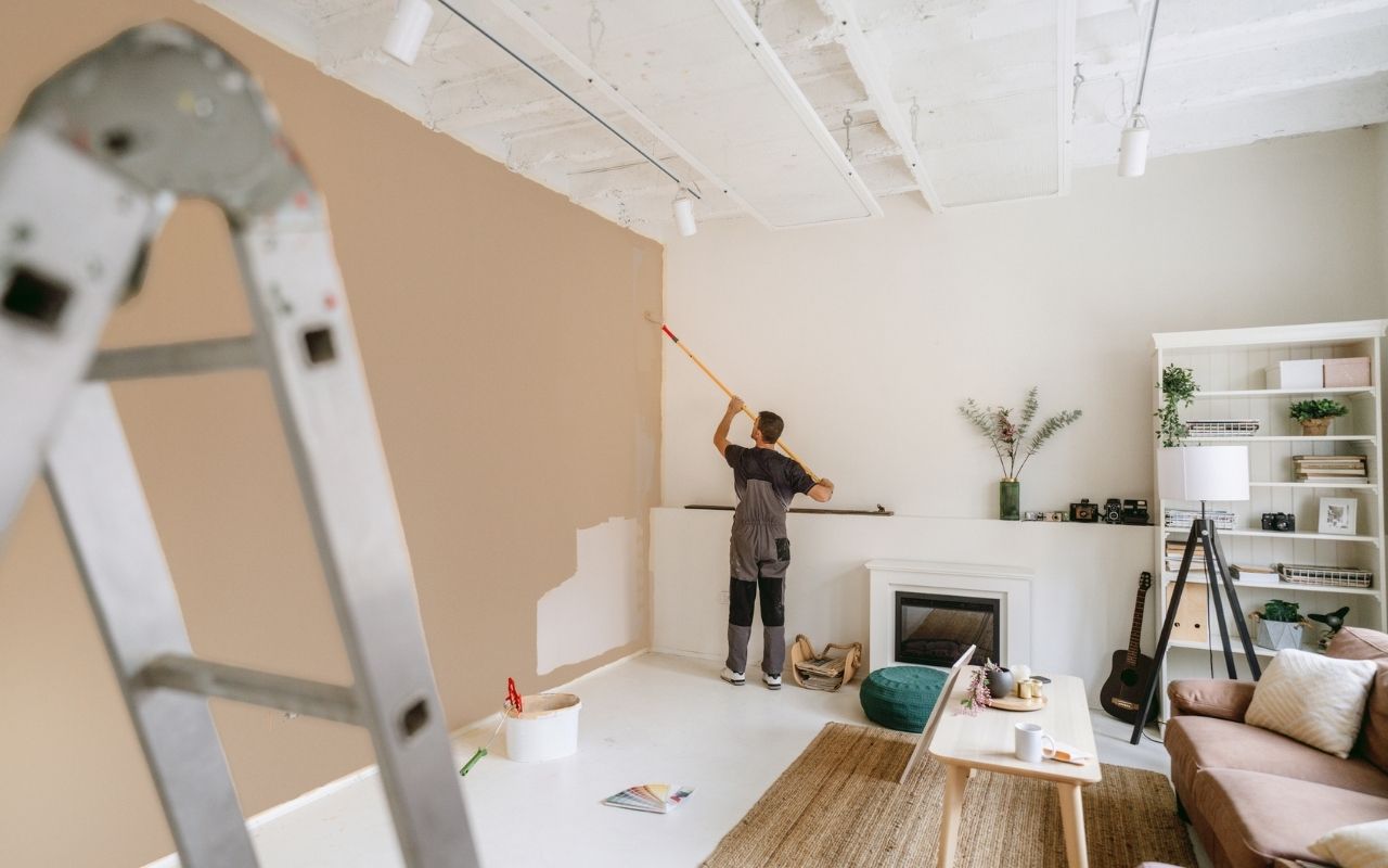 Licensed and insured painters preparing walls for durable paint